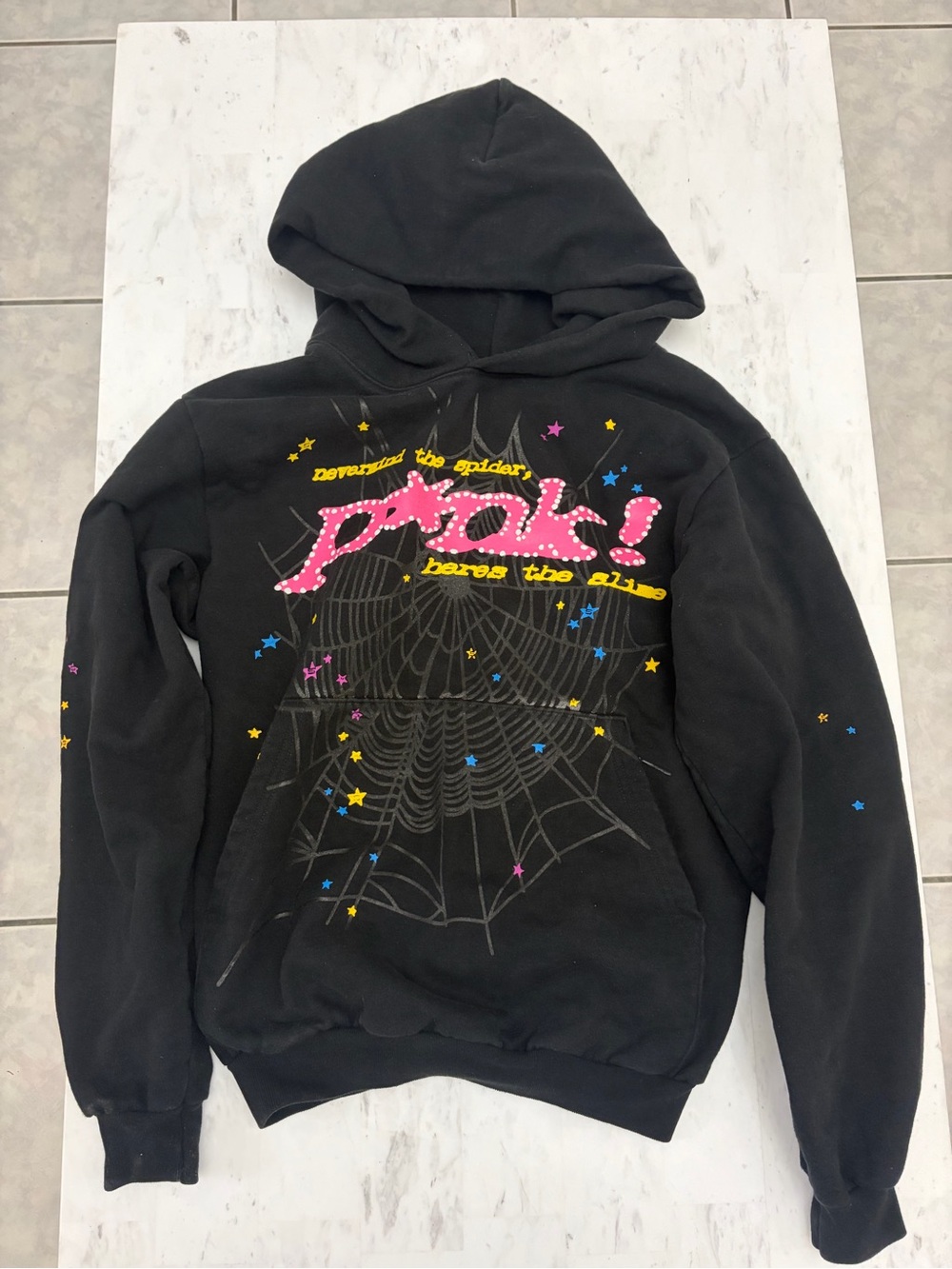 Sp5der Black Hooded Men's Sweater with Pink Graphic and Star Accents